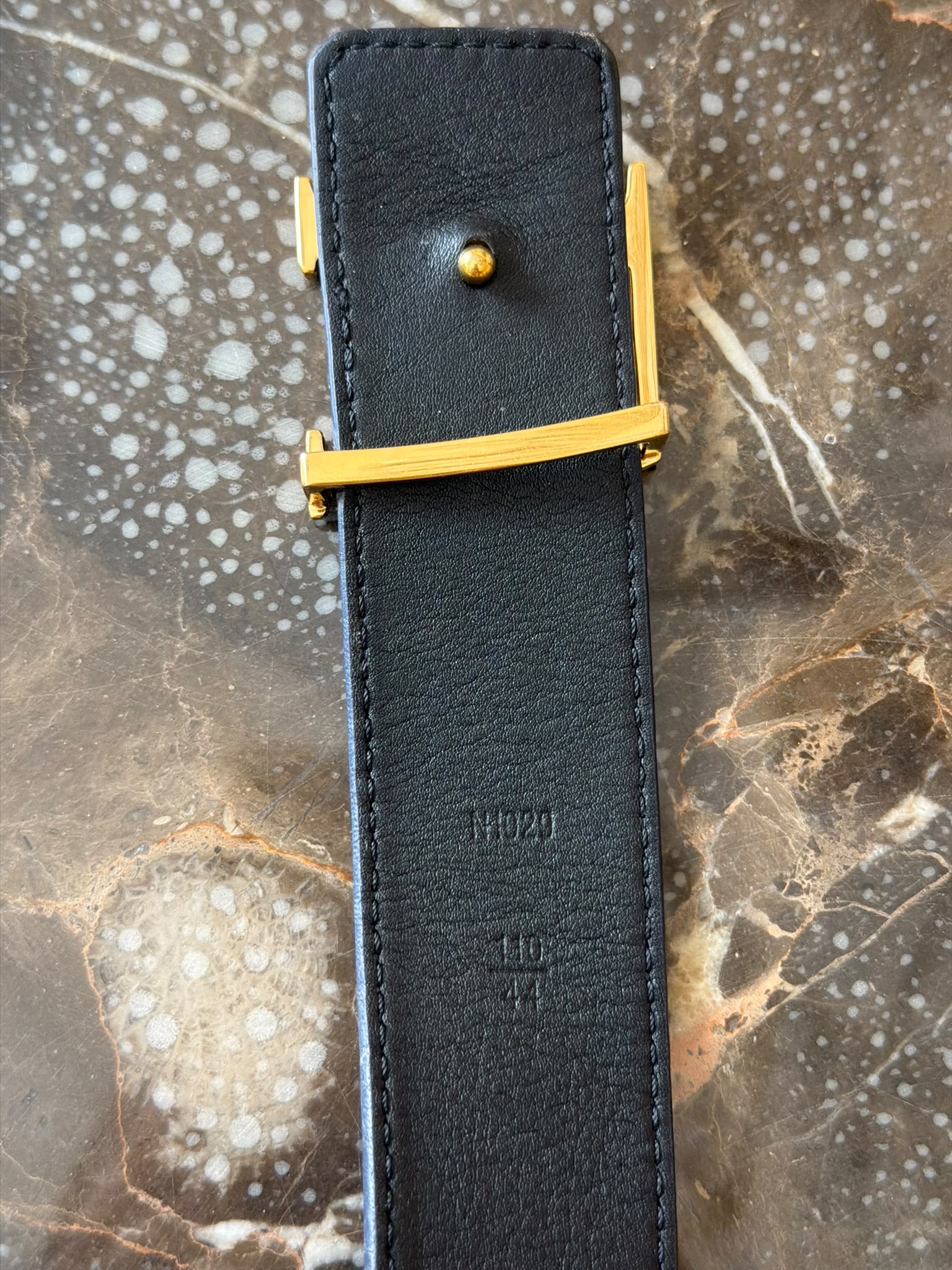 Louis Vuitton gold LV Initials buckle close up