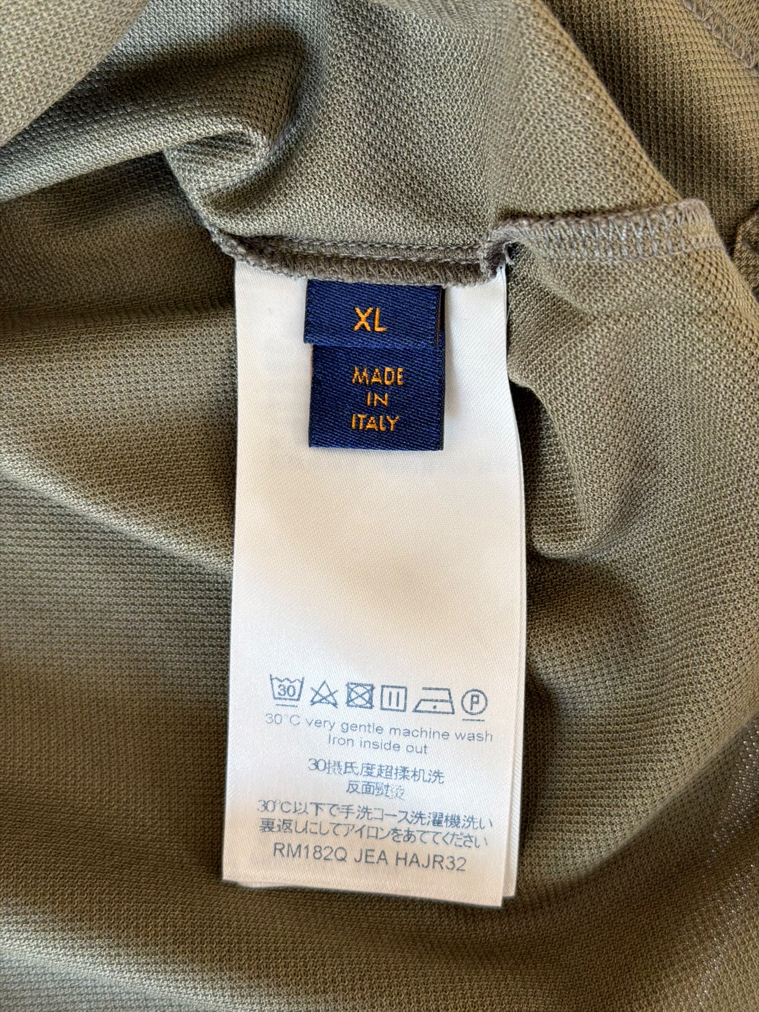 Louis Vuitton embroidered Circle LV chest logo