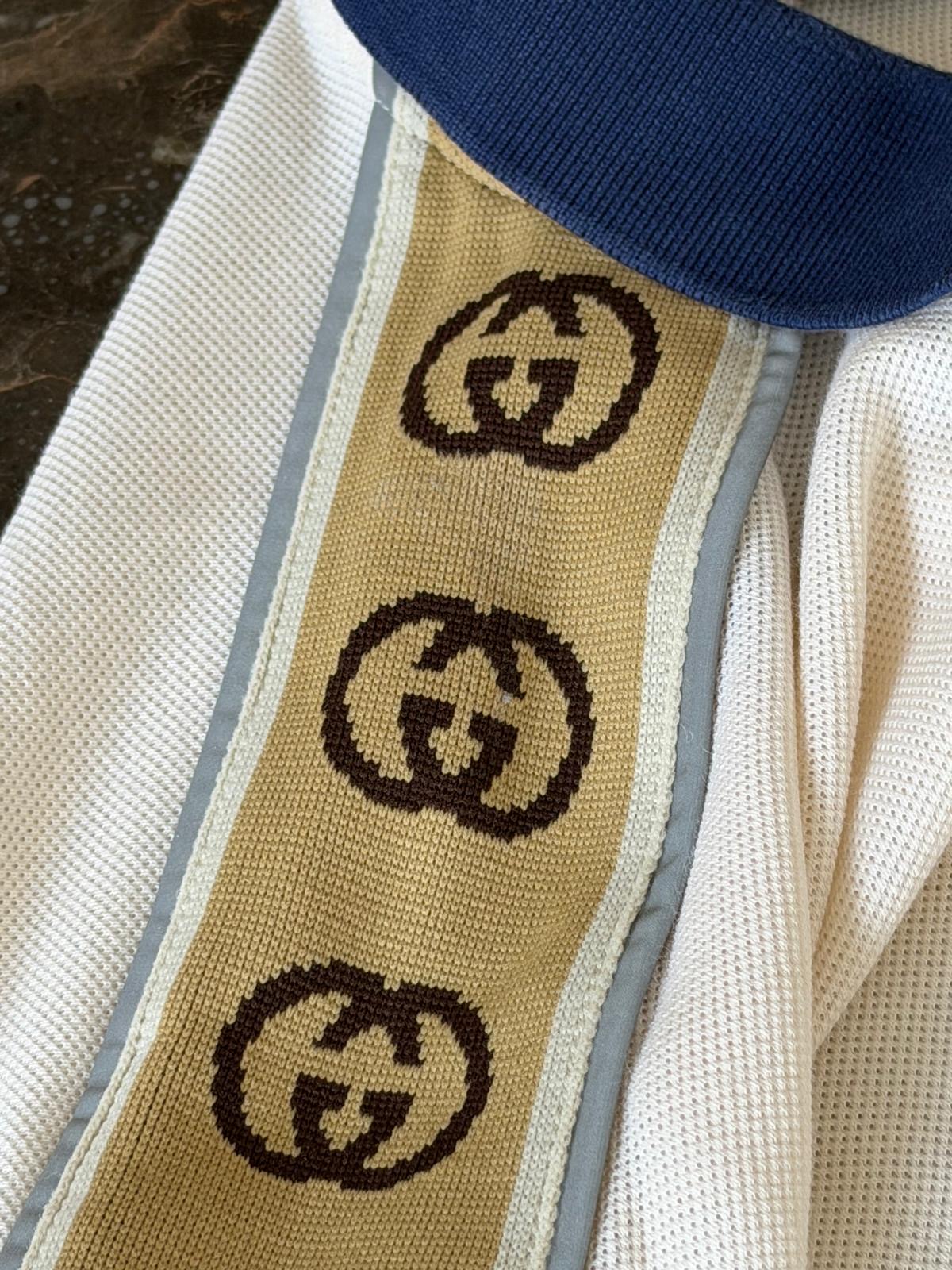 Close-up of Gucci Interlocking G jacquard sleeve stripe