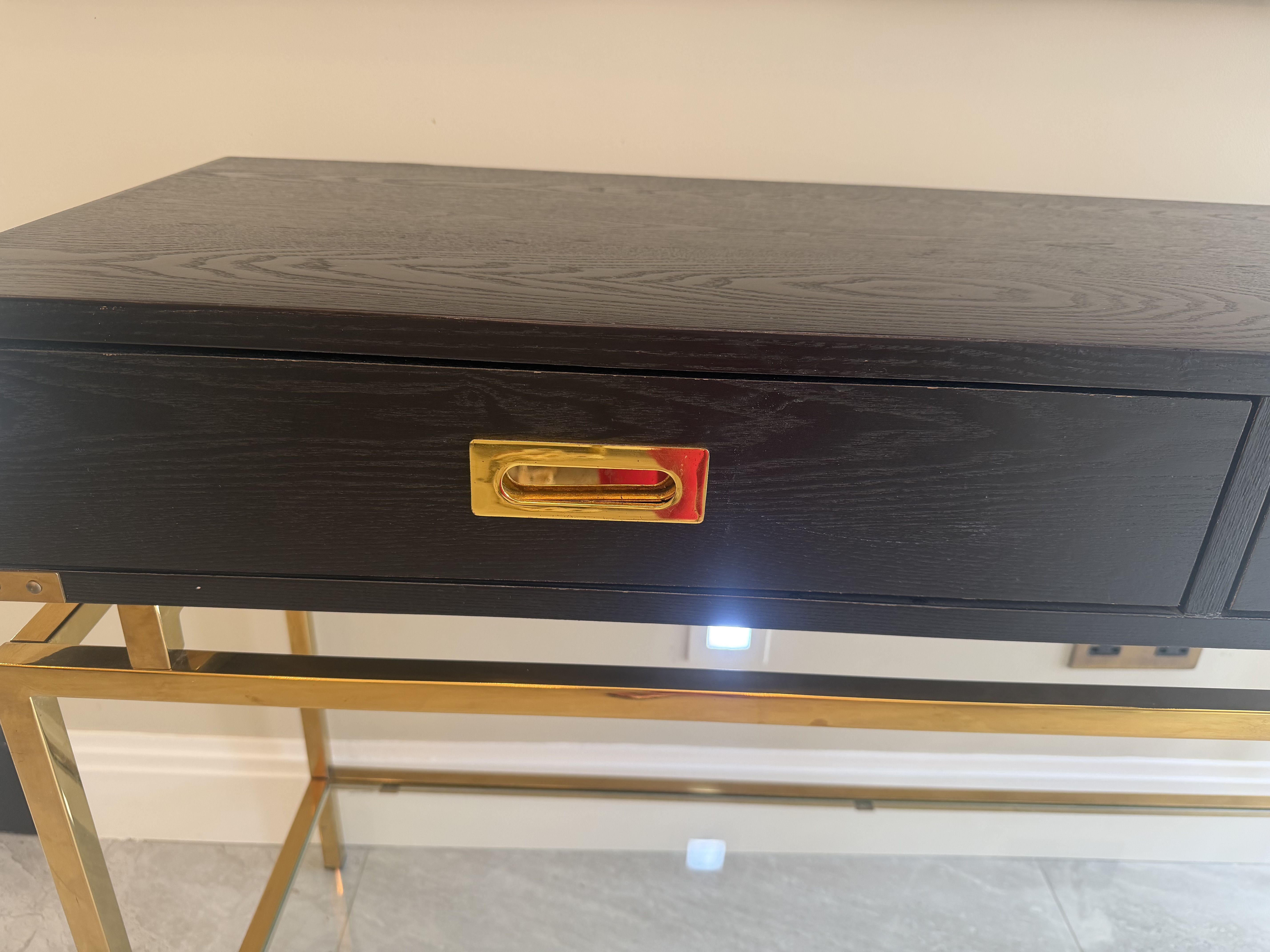 Genoa black ash console table with polished brass frame