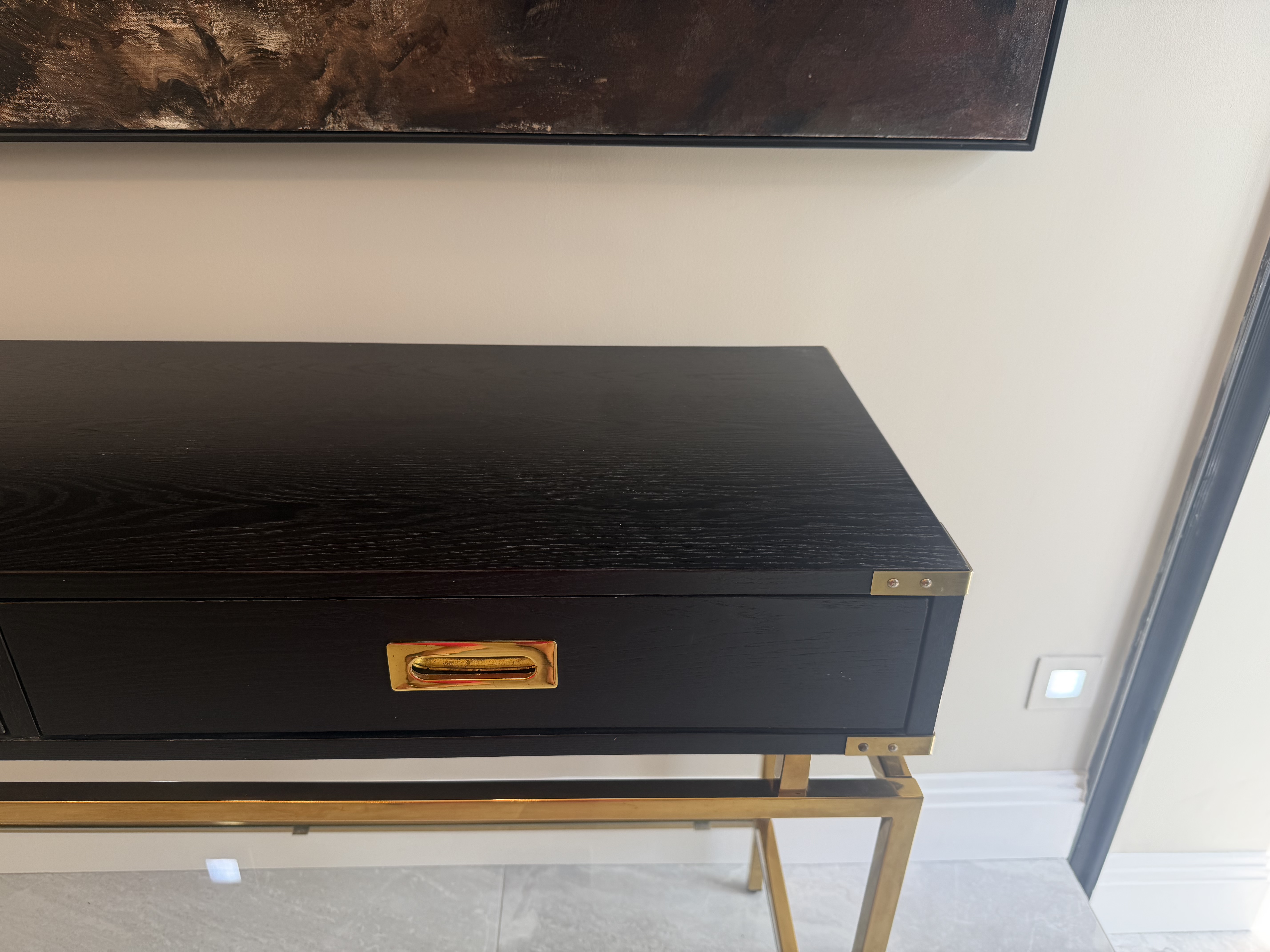 Liang and Eimil Genoa console with polished brass campaign corner detailing