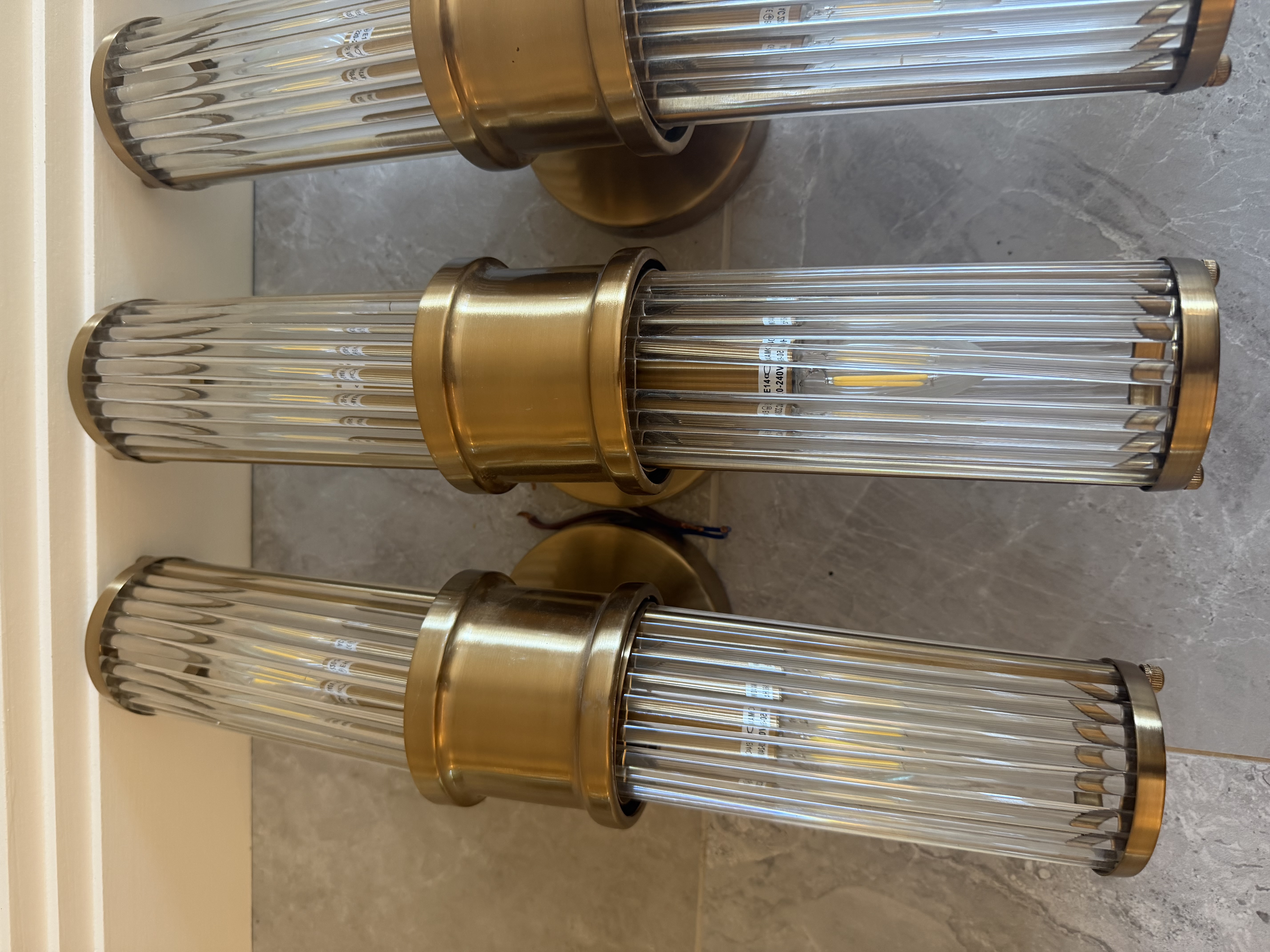Pair of Eichholtz Glorious XL wall lights in matte brass