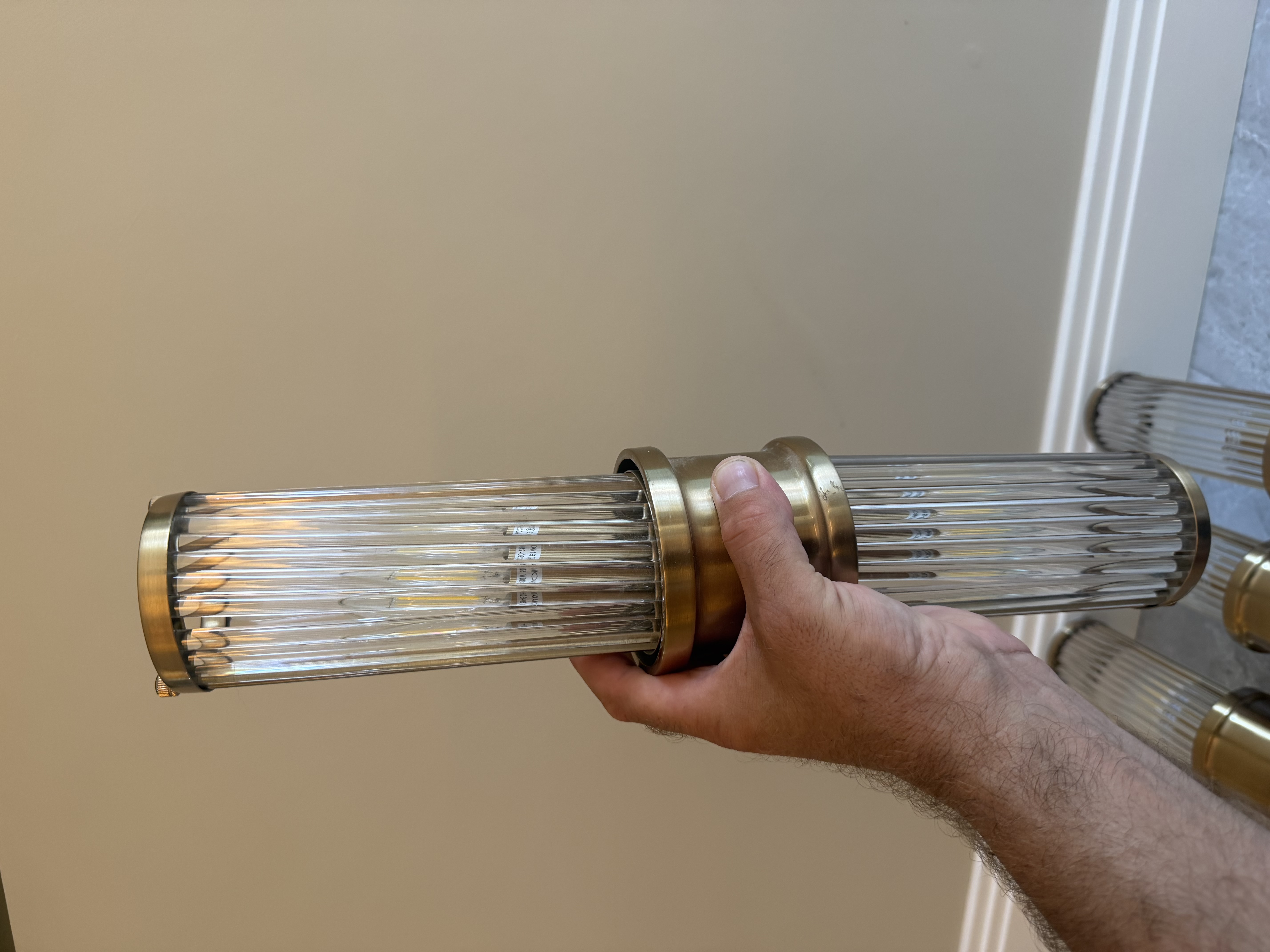 Eichholtz Glorious XL wall lamp showing 52 cm tall cylindrical design